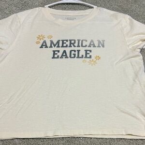 American Eagle Cream Tee with Gray and Gold Details
